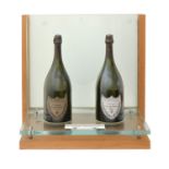 Wine. Champagne, Dom Perignon magnum display bottles and open glass stand for window display Note: