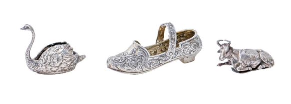 A Continental silver clog toy and cow snuff box, late 19th c, clog 95mm l and a miniature silver