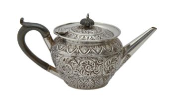 A Victorian silver teapot, chased with scrolling foliage, 10cm h, marks rubbed, London 1889, 7ozs