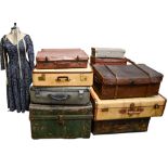 Seventeen leather and other suitcases and trunks, late 19th - mid 20th c and a dress maker's