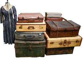 Seventeen leather and other suitcases and trunks, late 19th - mid 20th c and a dress maker's