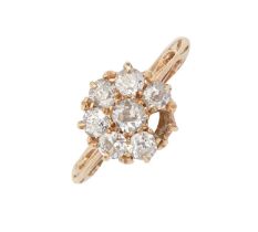 A diamond cluster ring, with old cut diamonds, in 18ct gold, Birmingham 1910, 4g, size M Lacks one
