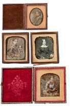 Daguerreotype portraits of three women and a girl with a doll, maroon morocco case or part