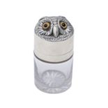 A Victorian silver mounted cylindrical glass owl novelty scent bottle, the head forming the lid