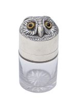 A Victorian silver mounted cylindrical glass owl novelty scent bottle, the head forming the lid