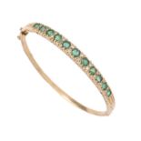 An emerald and diamond bangle, in 9ct gold, 56mm (internal), London 1989, 12.8g Several of the