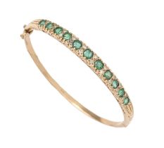 An emerald and diamond bangle, in 9ct gold, 56mm (internal), London 1989, 12.8g Several of the