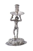 A Continental silver Harlequin figural chamberstick, 20th c, 12cm h, apparently unmarked, 3ozs 3dwts