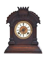 A North American stained wood shelf clock, Ansonia Clock Co New York, patented June 18 1892, with