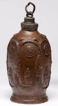 A Creussen flask, c1680-90, the six sided barrel shaped saltglazed brown stoneware vessel covered in