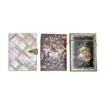 Three Victorian card cases, the papier mache example painted to back and front with flowers in