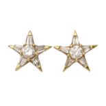 A pair of star shaped diamond ear studs, in 18ct gold, star 9mm, 2.1g Stem of one bent but unbroken