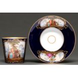 A German porcelain trembleuse cup and saucer, late 19th / early 20th c, painted with couples