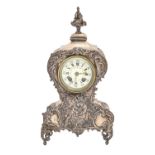 An Edwardian silver clock, with primrose enamel dial and French gong striking movement, the case