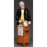 A Royal Doulton earthenware figure of The Auctioneer, 1986, 22cm h, printed mark and HN2988 Good