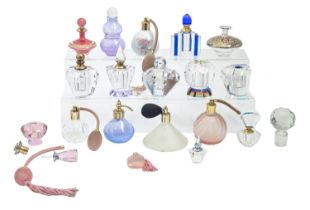 A collection of decorative glass scent bottles, several with atomiser attachment (approximately