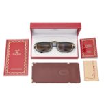 A pair of Le Must de Cartier sunglasses, Platine, No 798604, boxed