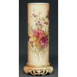 A Royal Worcester cylindrical vase, 1912, printed and painted with flowers on a shaded apricot