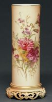 A Royal Worcester cylindrical vase, 1912, printed and painted with flowers on a shaded apricot