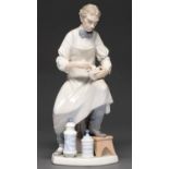 A Lladro figure of a chemist, 32cm h, printed mark Good condition