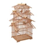 An architectural style light wood and bamboo bird cage, 64cm h Decorative and in good condition