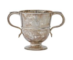 A George II silver cup, with plain girdle, on moulded foot, engraved with armorials, 13cm h, fully