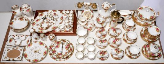 An extensive collection of Royal Albert Country Roses pattern dinner, tea and ornamental ware, to