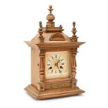 A German walnut mantel clock, early 20th c, with Junghans gong striking movement, pendulum, 45cm h