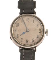 A silver wristwatch, wire lugs, 26mm diam, import marked London 1924 Movement running when wound and
