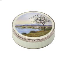 A Swiss silver and enamel box, early 20th c, the lid painted with a lake landscape, the border and