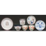 A Chinese export porcelain armorial trio, c1790, enamelled with a crest, initials and blue and