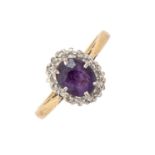 An amethyst and diamond cluster ring, gold hoop, 3.1g, size N Slight wear to hoop