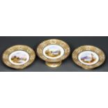 A set of three Coalport fruit stands, c1890, painted to the centre with a mountainous landscape, the