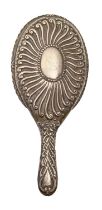 A Victorian silver hand mirror, the bevelled plate in crimped surround, by Charles Edwards, London