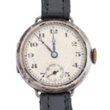 A silver lady's wristwatch, wire lugs, 25mm diam, import marked London 1933 Dial dusty, movement