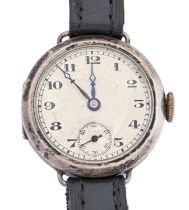 A silver lady's wristwatch, wire lugs, 25mm diam, import marked London 1933 Dial dusty, movement