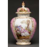 A German porcelain jar and cover, early 20th c, painted with lovers alternating with pink ground