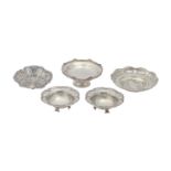 Two and a pair of George V silver sweetmeat dishes and a Continental silver butter shell, various