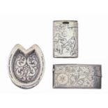 A Victorian horseshoe shaped trinket box and cover, stamped with foliate scrolls, 75mm l, by