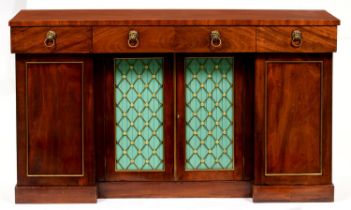A Victorian mahogany chiffonier, fitted with three drawers above panelled or brass trellis doors,