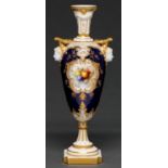 A Royal Worcester mask handled vase, c1930, painted by Chivers, signed, with fruit in raised gilt