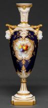 A Royal Worcester mask handled vase, c1930, painted by Chivers, signed, with fruit in raised gilt