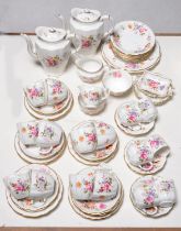 A Royal Crown Derby Derby Posies pattern tea and coffee service, late 20th c, printed marks and a