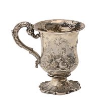 A Victorian silver christening mug, of campana shape, chased with reserves of fruit, on spool