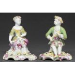 A pair of Longton Hall figures of a seated boy and girl, 'Spring' and 'Summer', c1758-1760, in