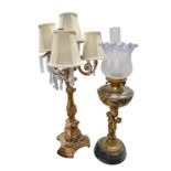 A gilt-brass and glass figural oil lamp, c. 1900, 74cm h, a four-light table lamp, 20th c, triform