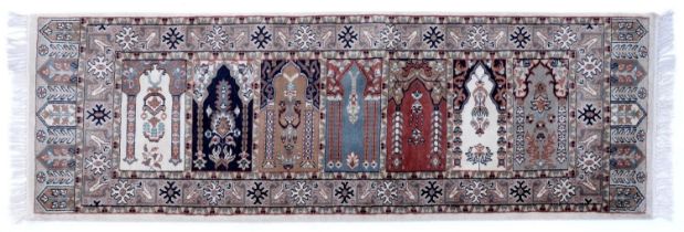 An Indian saf rug,  184 x 62cm