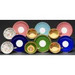 Six Aynsley Harlequin teacups and saucers, second half 20th c, the cups decorated with fruit or