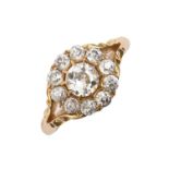 An Edwardian diamond cluster ring, in 18ct gold, Birmingham 1909, 4.3g, size N Several claws short