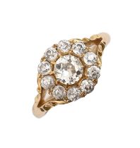 An Edwardian diamond cluster ring, in 18ct gold, Birmingham 1909, 4.3g, size N Several claws short